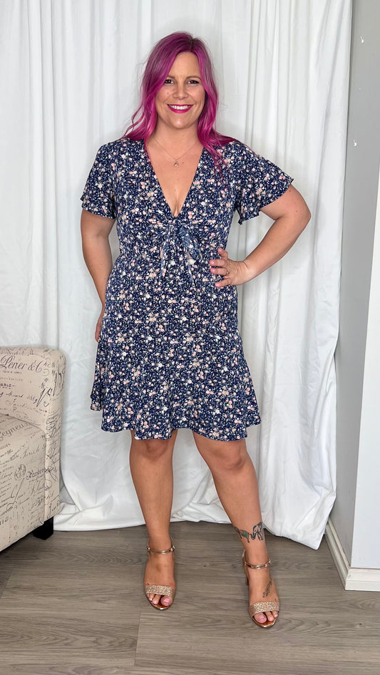 Amber Dress: The Amberly Dress is a sweet little number featuring flutter sleeves and a tie up bust. Due to the adjustable bust it is accommodating to most sizes

Tie up bust
Min - Ciao Bella Dresses - Blush Clothing Playhouse