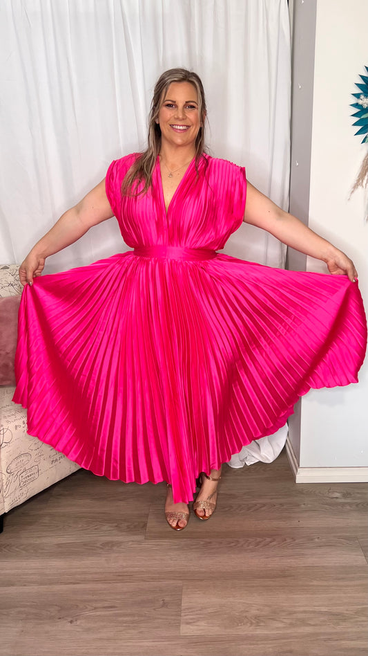 Nyomi Pleated Dress: The Nyomi hot pink pleated dress is the epitome of style, elegance, and confidence. It's perfect for special occasions, from weddings to gala events, where you want  - Ciao Bella Dresses - Pink Diamond