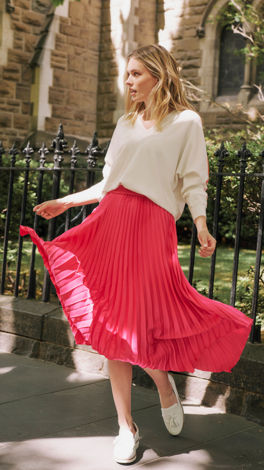 Louis Pleated Skirt | Betty Basics | Introducing the Pleated Skirt, where comfort meets playful style in the most laid-back way! With its elastic waistband, this skirt ensures a perfect fit and all-day