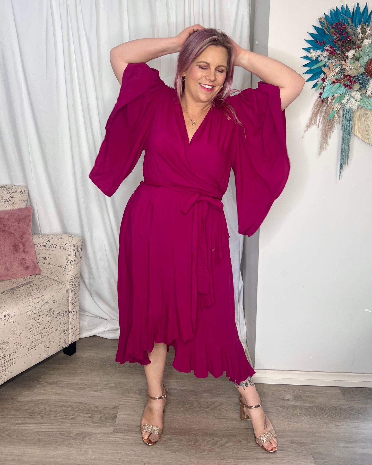 Gabrielle Wrap Dress: The Gabrielle dress is a truly stunning offering. It features beautiful ruffles to the front and graceful, full-length sleeves, for a delicate, and timeless silhoue - Ciao Bella Dresses