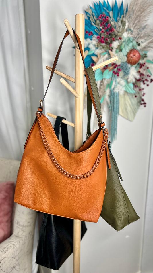 Britany Shoulder Bag: Britany is a gorgeous classic shape with the beautiful added detail of a chain feature  
It has an adjustable handle with buckles of gold hardware plus 1 zip and two - Ciao Bella Dresses - Sassy Duck