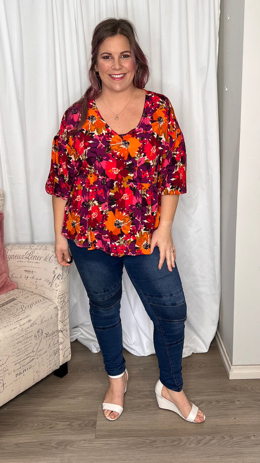 Yasmin Bubble Sleeve Top:  
With its trendy V-neckline and dropped shoulder into bubble sleeves, this top exudes effortless style. The relaxed fit offers ultimate comfort, while the back keyh - Ciao Bella Dresses - Sass Clothing