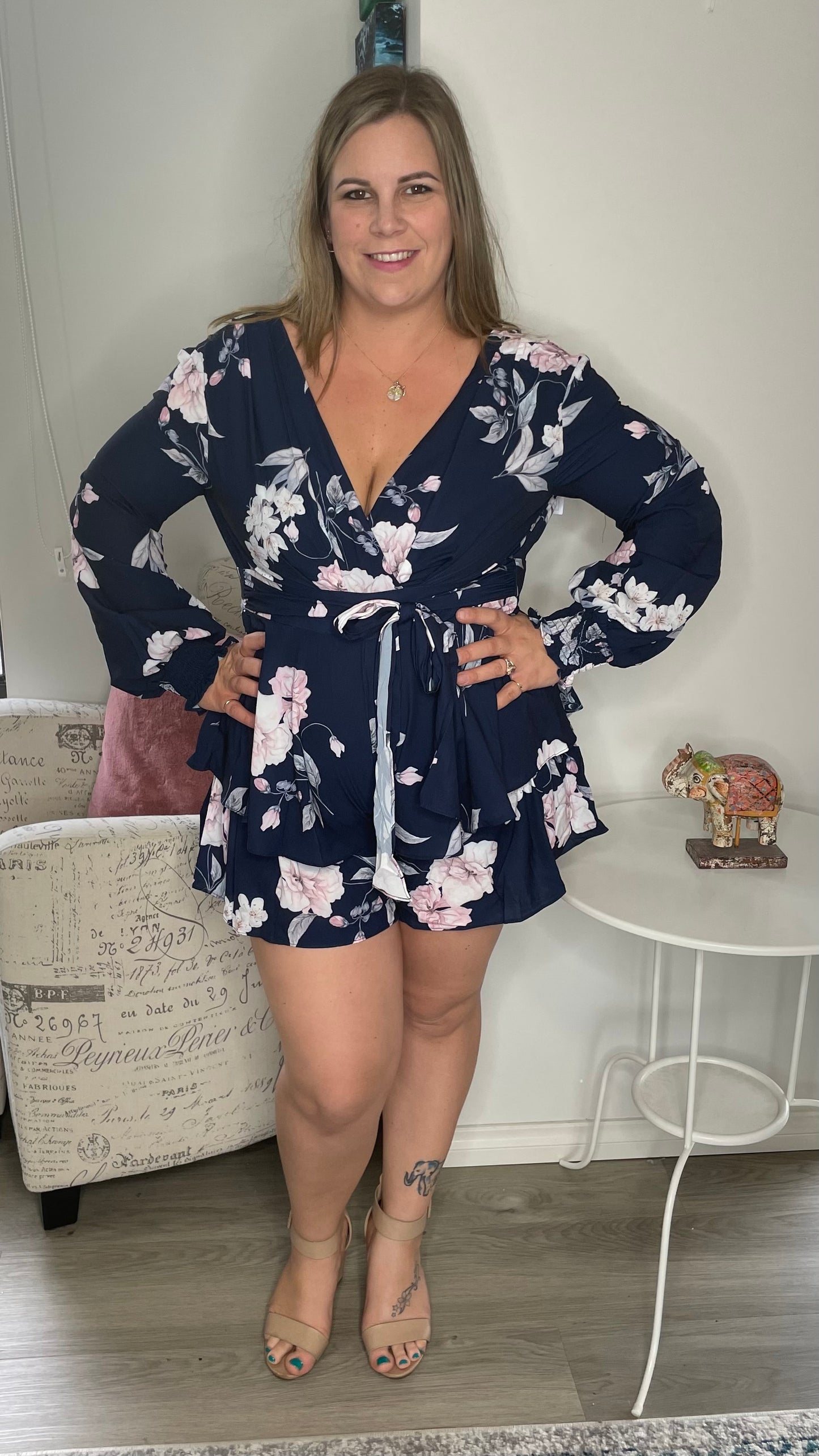 Daphne Playsuit - Navy Blossom | Style State | An old favourite in stunning new prints
Zip up back
Self tying waist sash
Breastfeeding friendly - pull aside to feed
Elasticated wrists
True to size
Danika wears a
