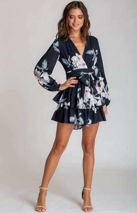 Daphne Playsuit - Navy Floral | Style State |
Polyester
Printed fabrication
V-neckline design
Bubble sleeves
Elastic detailing around cuff
Self-fabric belt tie on front
Waist seam panel for flattering fit
Featu