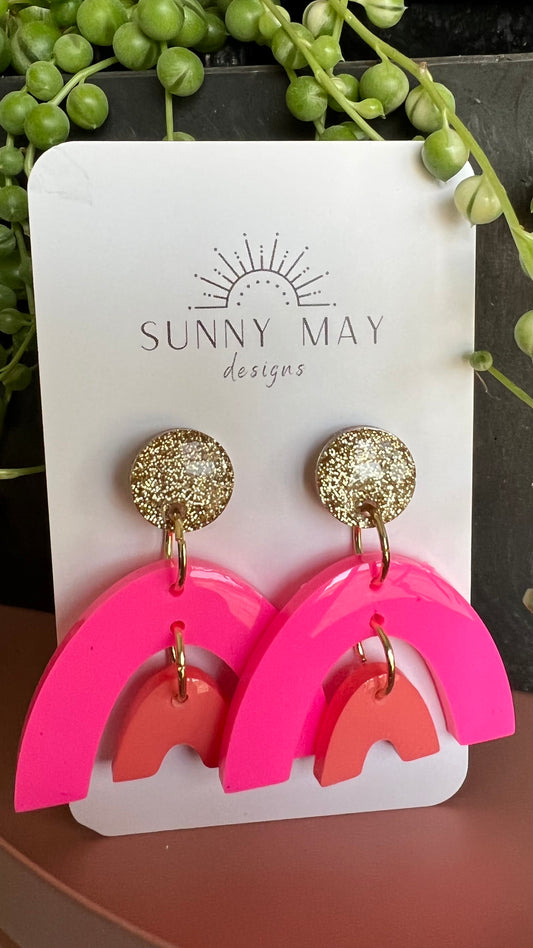 Sunny May Bold Earrings - Happy Rainbow: These earrings are handmade from a delightful mix of colours and glitter, creating the perfect mix of vibrant colour and shine
They feature various coloured jump rin - Ciao Bella Dresses - Sunny May Designs