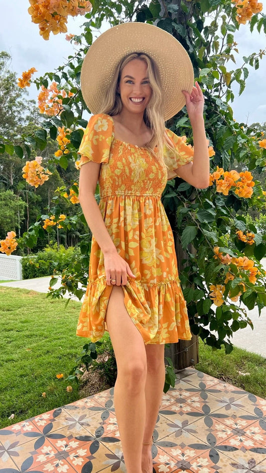 Maya Dress - Sunrise: Shine like a ray of sunshine in the Maya Dress. This sweet little number has sleeves that can be worn on or off the shoulder and a shirred bust, giving it a gorgeous - Ciao Bella Dresses - Mylk the Label