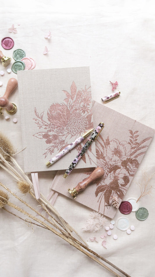 Typoflora Lined Linen Notebook: This luxurious notebook is a stunning addition to your home office or personal stationary stash

160 lined pages
linen bookcloth hardcover with printed floral design - Ciao Bella Dresses - Typoflora