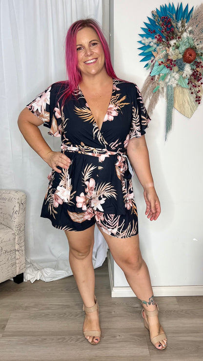 *NEW* Lynette Playsuit - Hot Pink Floral | Sao by Dee | The Lynette Playsuit features a gorgeous V neckline, attached waist tie to tie to the front and a tiered ruffle overlay on the bottom half. A reason to love a playsu