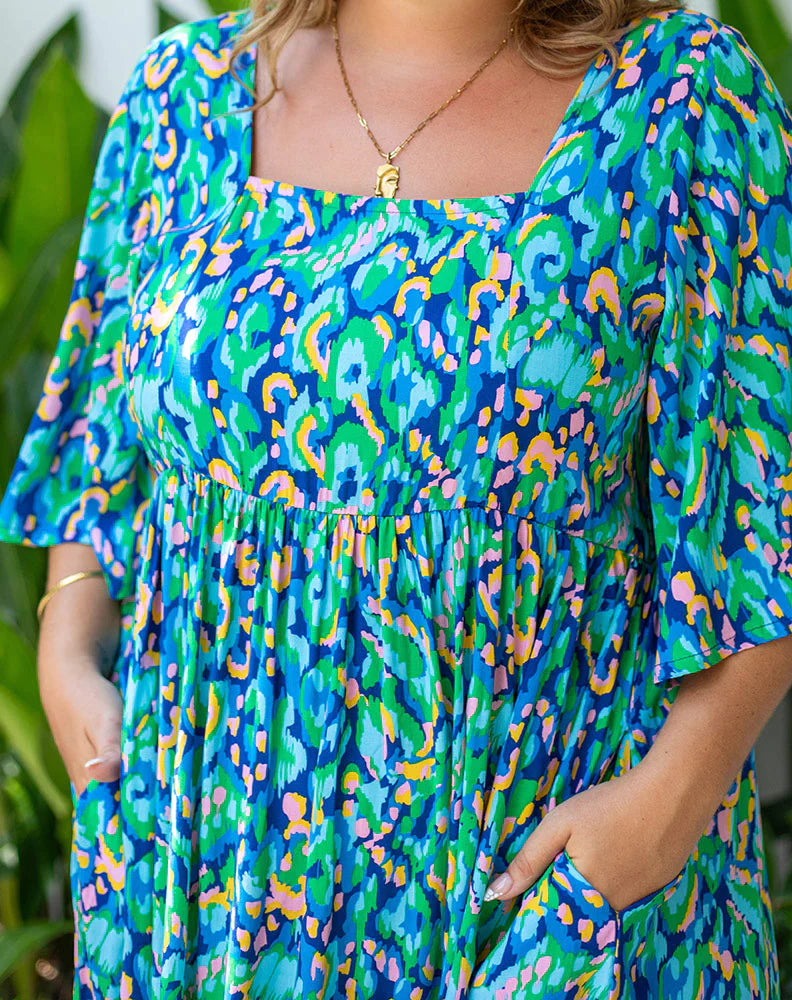 **NEW** Kalani Maxi Dress - Abstract Blue | Bee Maddison | 
Our Kalani Dress is a summer show stopper! That print, the cut, the maxi length ... it is stunning. A flattering square cut neckline is complimented by a flowing sl