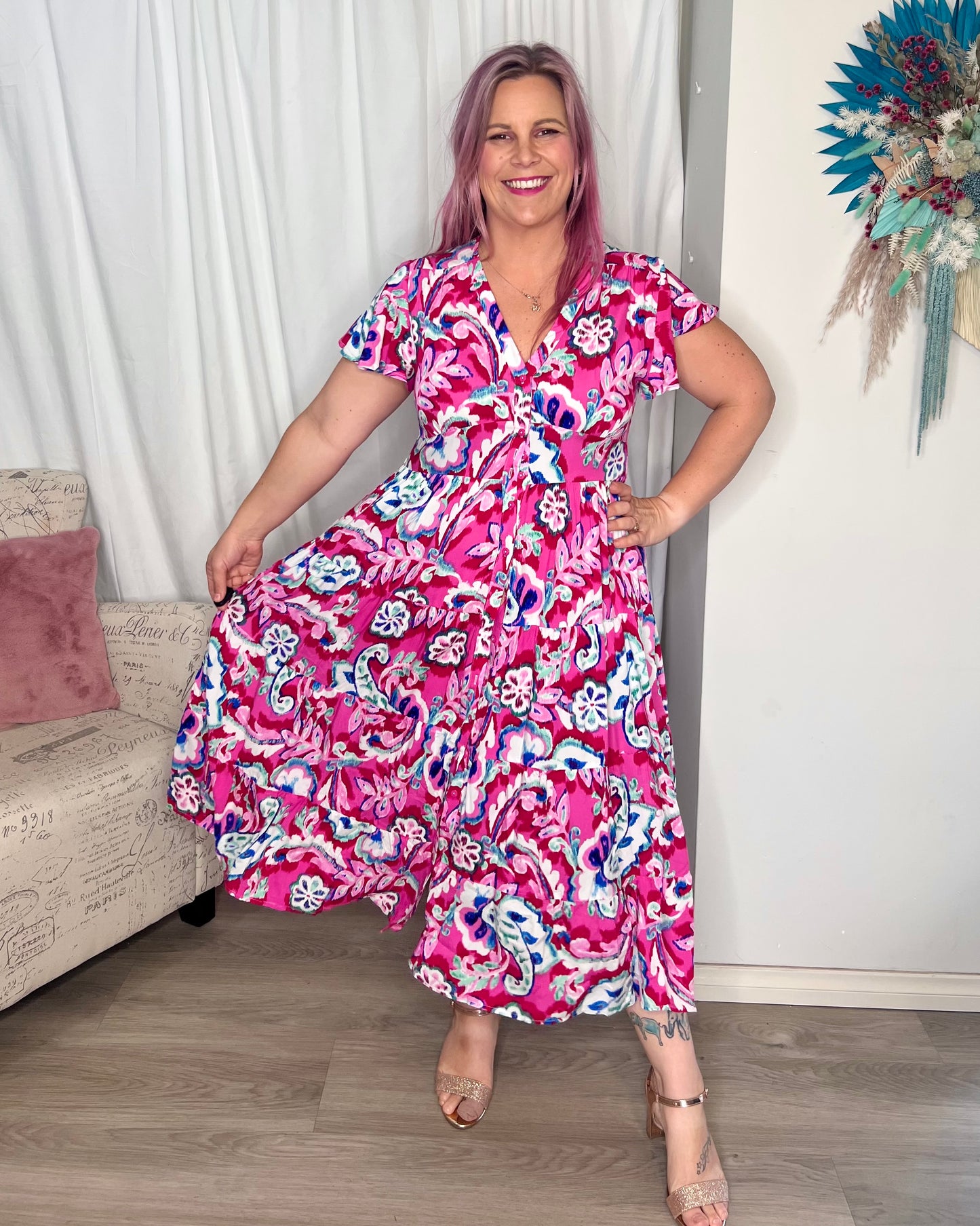 Stella Midi Dress: The Stella Dress features a vibrant pink print in pink and blue, with flutter sleeves and a shirred waist band creating a stunning silhouette
Features:

V-neckline t - Ciao Bella Dresses 