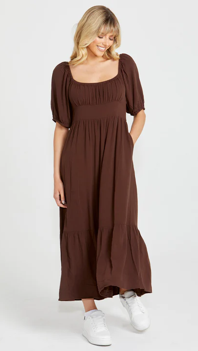 Yasmin Midi Dress - Brown | Sass Clothing | Introducing the Yasmin Frill Hem Midi Dress! With its flirty frill hem and elasticated square neckline, it exudes confidence and grace. The back shirred panel ensure