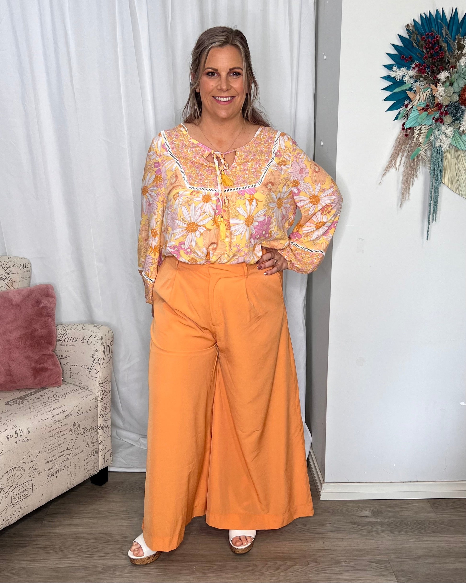 Lillian Palazzo Pants - Melon | Sass Clothing | The Lillian Palazzo Pants are a stunning shape to take you from office to after hours, year round. The pleats at the top streamline into a wide leg for the utmost in