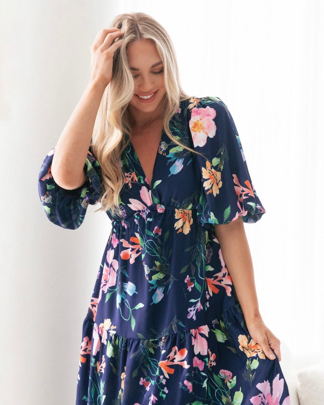 Picture Perfect Floral Midi Dress: Picture Perfect by name, Picture Perfect by nature. The stunning watercolour floral print against a navy background make this dress the picture perfect option to you - Ciao Bella Dresses 