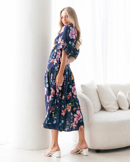 Picture Perfect Floral Midi Dress | Ebby and I | Picture Perfect by name, Picture Perfect by nature. The stunning watercolour floral print against a navy background make this dress the picture perfect option to you