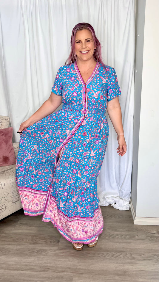 **NEW** Emmy Boho Dress: The Emmy Dress features a beautiful soft songbird pattern in one of our most popular shapes. This gorgeous dress features a thick shirred waistband, functional butto - Ciao Bella Dresses