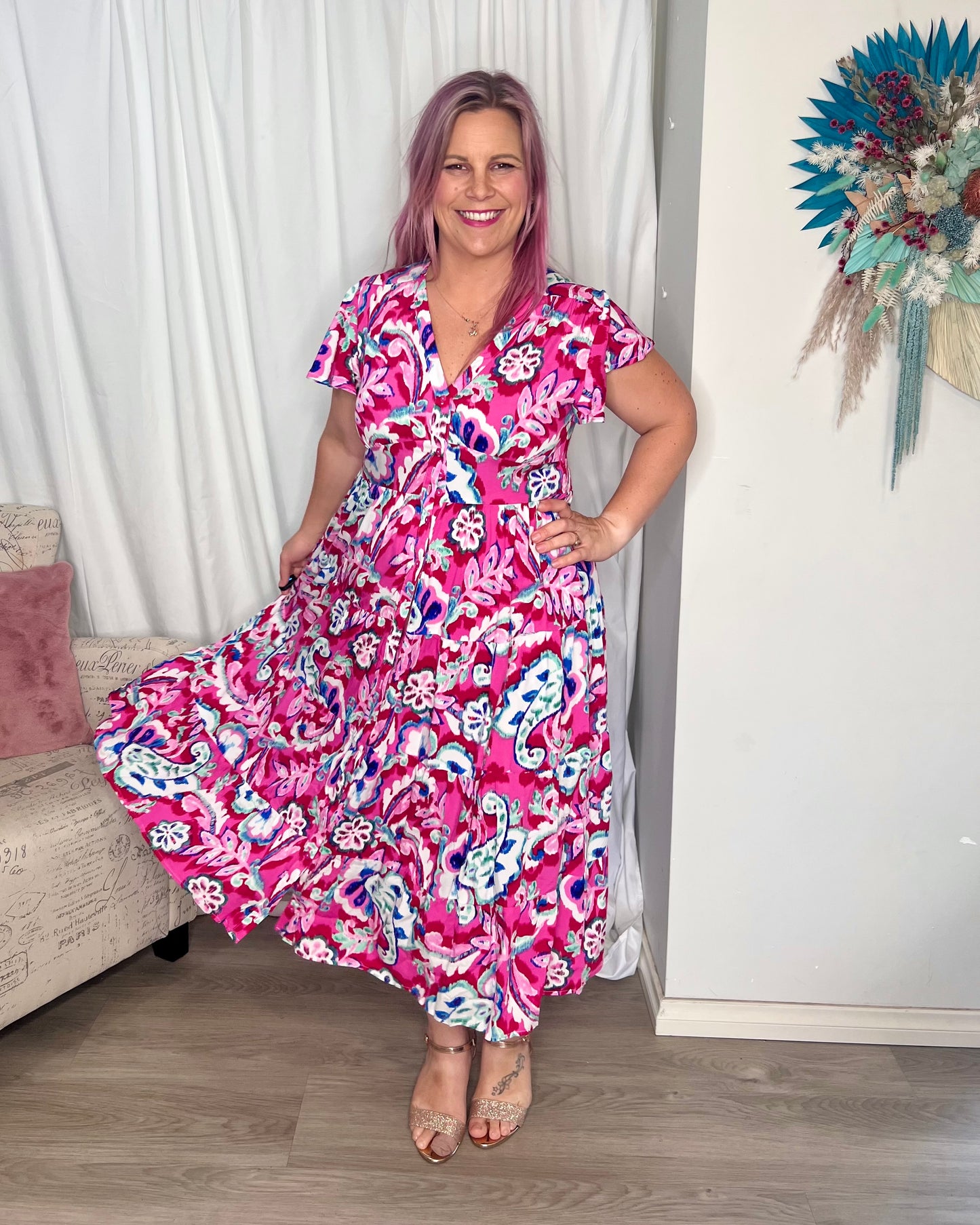 Stella Midi Dress: The Stella Dress features a vibrant pink print in pink and blue, with flutter sleeves and a shirred waist band creating a stunning silhouette
Features:

V-neckline t - Ciao Bella Dresses 