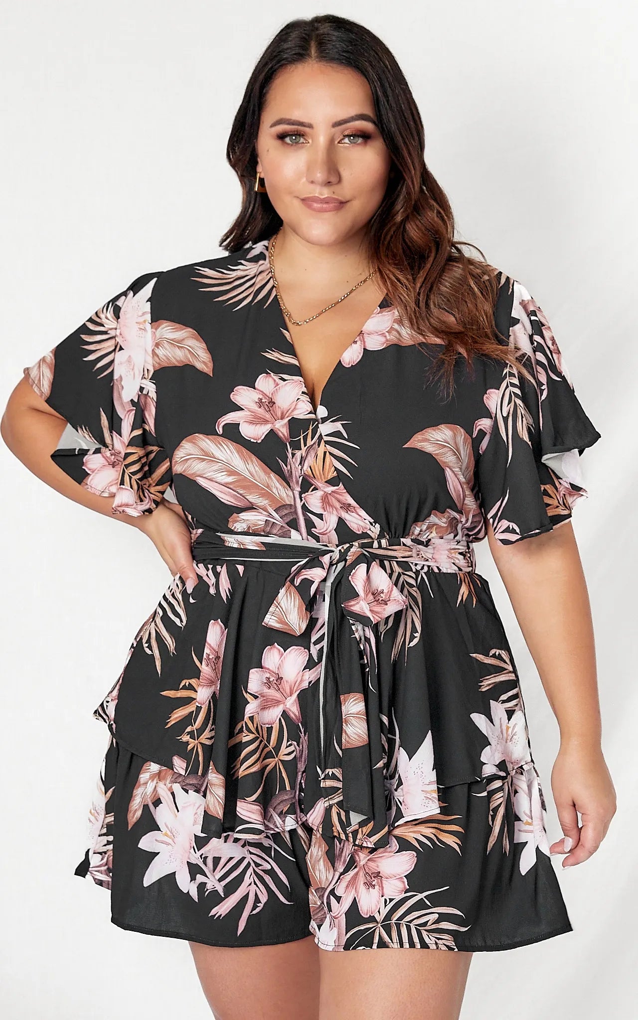 *NEW* Lynette Playsuit - Hot Pink Floral | Sao by Dee | The Lynette Playsuit features a gorgeous V neckline, attached waist tie to tie to the front and a tiered ruffle overlay on the bottom half. A reason to love a playsu