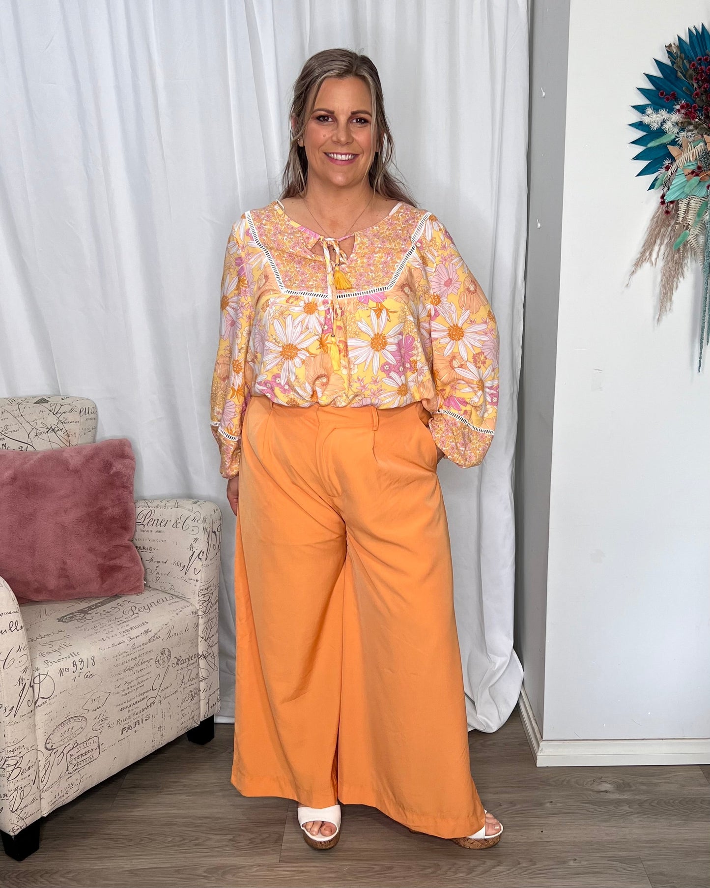 Lillian Palazzo Pants - Melon | Sass Clothing | The Lillian Palazzo Pants are a stunning shape to take you from office to after hours, year round. The pleats at the top streamline into a wide leg for the utmost in