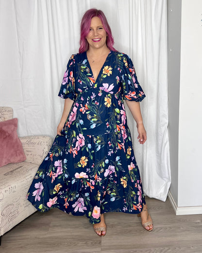 Picture Perfect Floral Midi Dress | Ebby and I | Picture Perfect by name, Picture Perfect by nature. The stunning watercolour floral print against a navy background make this dress the picture perfect option to you