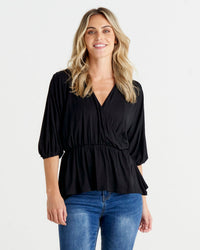 Bayeaux Wrap Top - Black | Betty Basics | The Bayeaux Top combines a classic shape with a comfortable fit, making this the go to when pairing with your fave bottoms
Features:

Faux wrap (breastfeeding friend