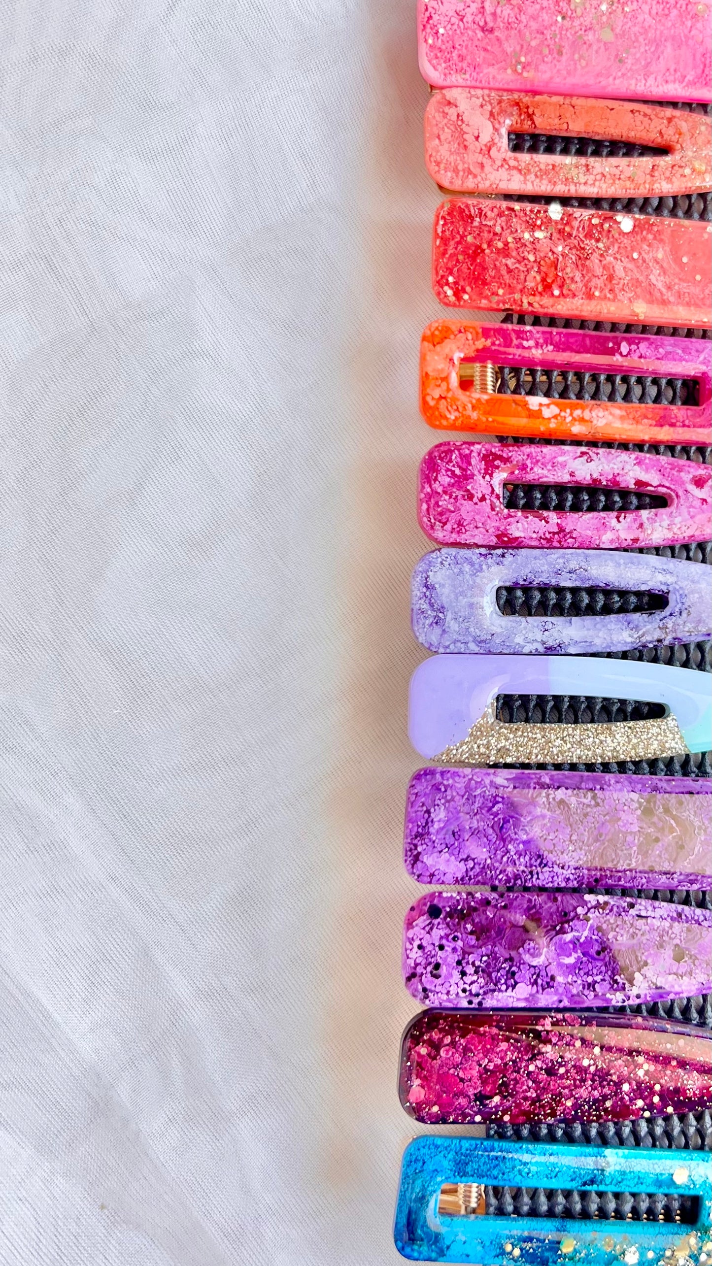 Sunny May Hair Clips: These hair slides are handmade from a delightful mix of colours and glitter, creating the perfect mix of vibrant colour and shine to brighten up your outfit
These go - Ciao Bella Dresses 