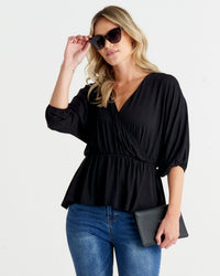 Bayeaux Wrap Top - Black | Betty Basics | The Bayeaux Top combines a classic shape with a comfortable fit, making this the go to when pairing with your fave bottoms
Features:

Faux wrap (breastfeeding friend