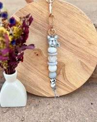 Oto & Iti Keyring | Oto & Iti | Add some personality to your keys or bag with a handmade keyring by Oto &amp; Iti
Features: 

Lobster claw
Silicone beads
Varied designs

Hardware: Varied - gold loo