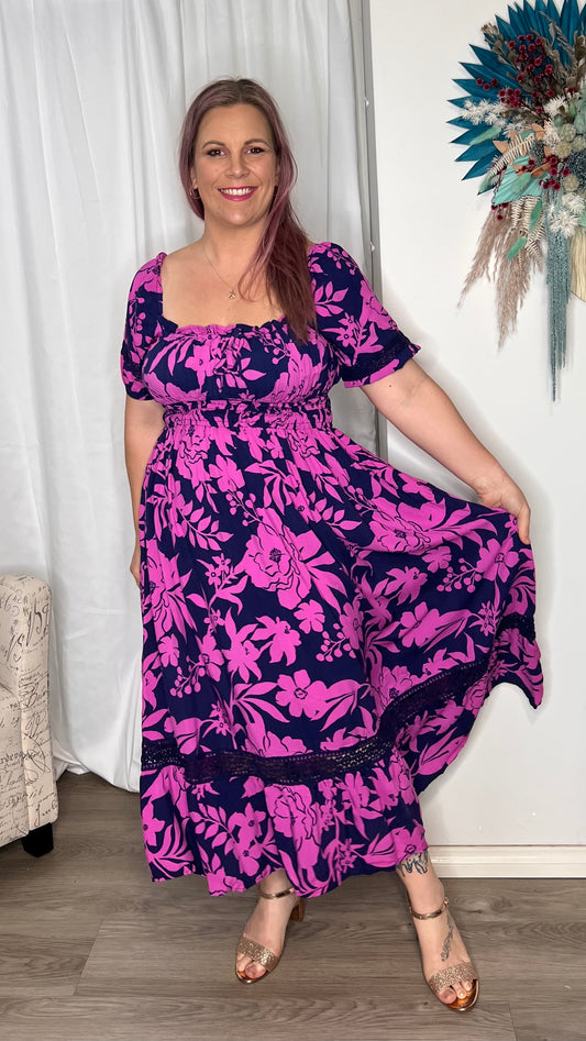 Esmee Midi Dress: A twist on our bestselling Kirrily Dress, the Esmee has all the same features in a stunning new print

Shirred elasticated waist band
Bodice gathered at top
Pull dow - Ciao Bella Dresses 