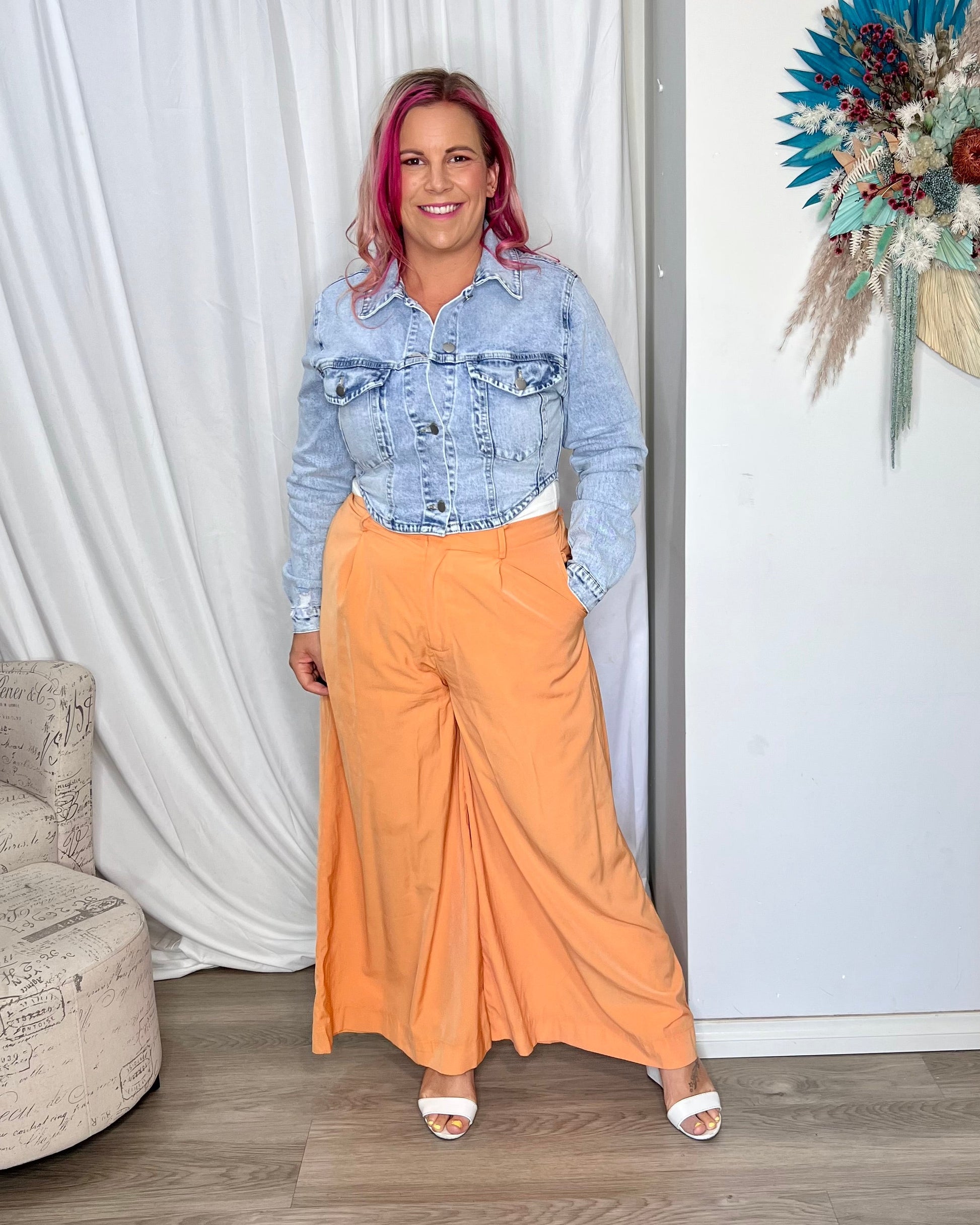 Lillian Palazzo Pants - Melon | Sass Clothing | The Lillian Palazzo Pants are a stunning shape to take you from office to after hours, year round. The pleats at the top streamline into a wide leg for the utmost in