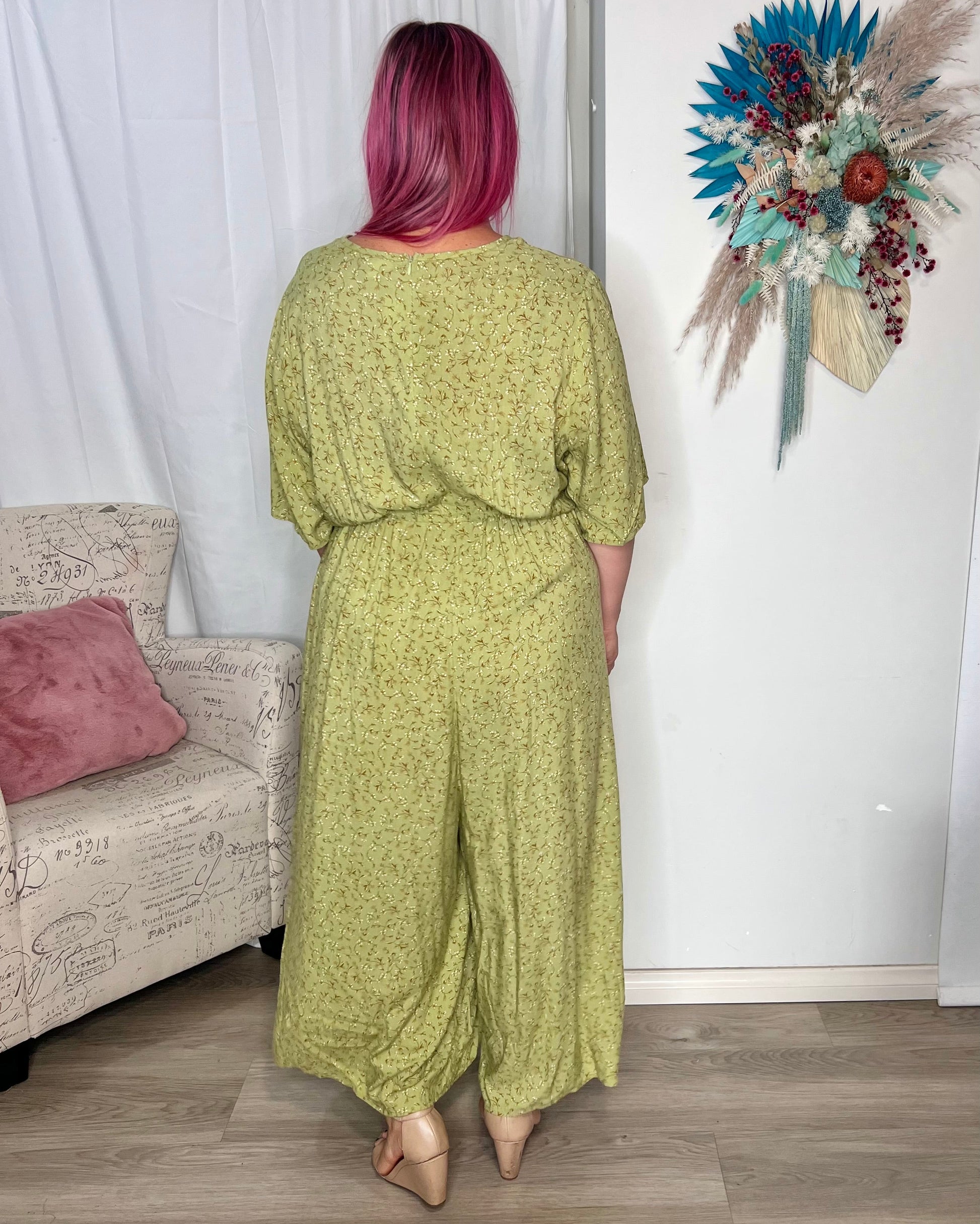 Morgan Jumpsuit - Green Wildflower | Peach the Label | Super fun, super floaty and creates an instant one-item outfit! We love how easy to wear this jumpsuit is with its versatile fit - cinch it in as much or as little a