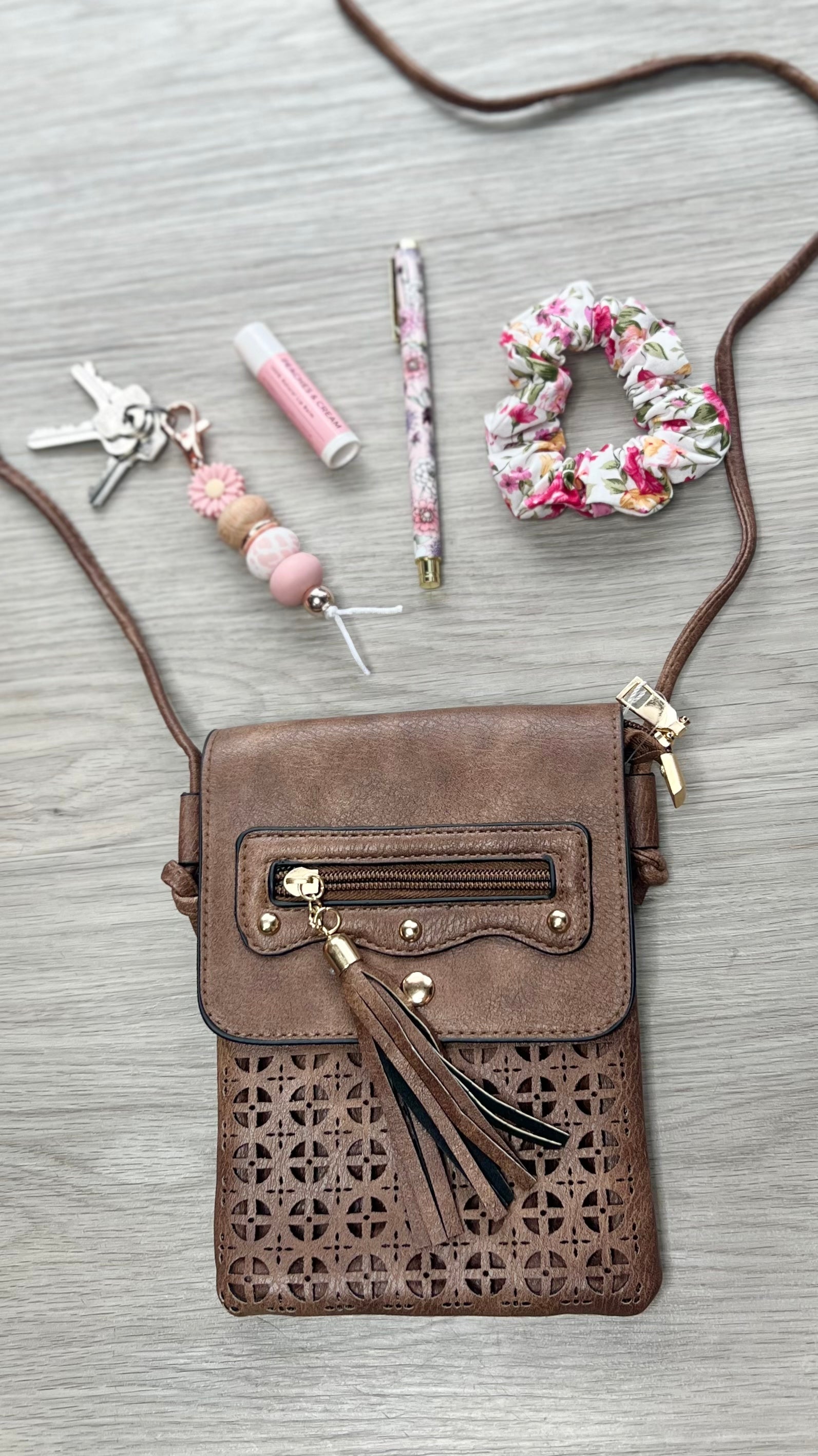 *NEW* Crossbody Bag - Crosshatch Tassel:  
Enjoy the perfect, outfit addition with our Crosshatch Tassel Crossbody Bag - the ultimate complement to your style!! Find your shade from our selection, and be su - Ciao Bella Dresses