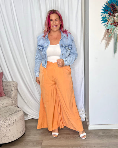 Lillian Palazzo Pants - Melon | Sass Clothing | The Lillian Palazzo Pants are a stunning shape to take you from office to after hours, year round. The pleats at the top streamline into a wide leg for the utmost in