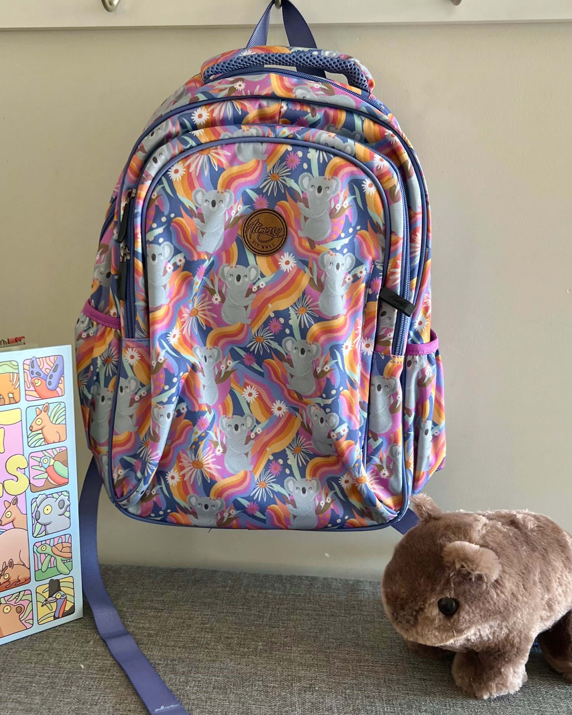 **NEW** Alimasy Midsize Backpack: 
The perfect size for a day out in gorgeous prints, sure to make an impression. Alimasy bags are built to last, created with the perfect balance between durability a - Ciao Bella Dresses 
