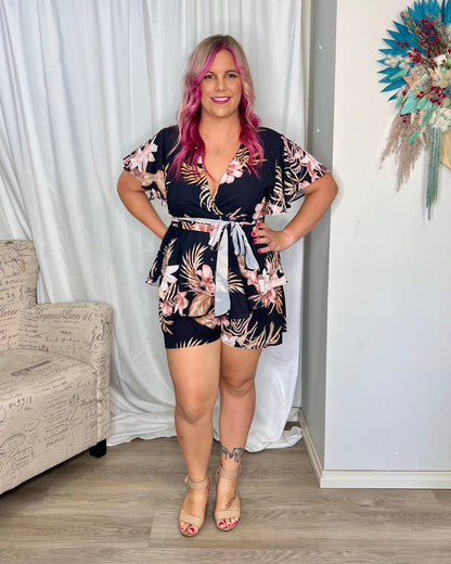 *NEW* Lynette Playsuit - Hot Pink Floral | Sao by Dee | The Lynette Playsuit features a gorgeous V neckline, attached waist tie to tie to the front and a tiered ruffle overlay on the bottom half. A reason to love a playsu