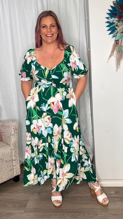 Miller Dress: The Miller Dress is the perfect dress for your next Spring gathering. It features a gorgeous shaped bust with a ruched middle, and super cute puff sleeves to match.  - Ciao Bella Dresses 