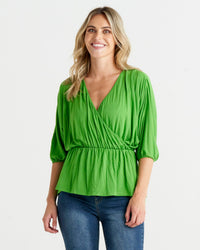 Bayeaux Wrap Top - Green | Betty Basics | The Bayeaux Top combines a classic shape with a comfortable fit, making this the go to when pairing with your fave bottoms
Features:

Faux wrap (breastfeeding friend