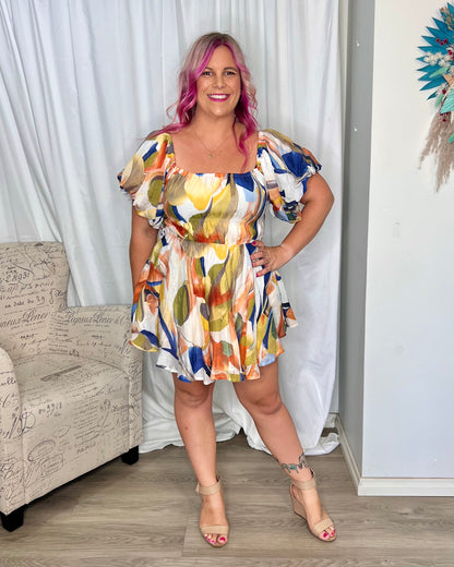 **NEW** Nara Mini Dress: The Nara Dress comes in a fantastic white multi abstract print, this cute mini style has an off shoulder neckline that can also be worn on the shoulders. It features - Ciao Bella Dresses - Mica by Amica