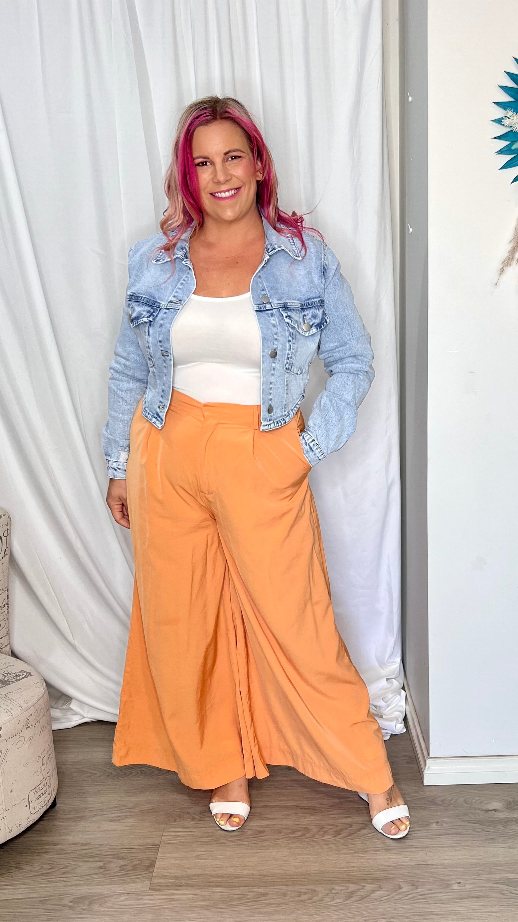 Lillian Palazzo Pants - Melon | Sass Clothing | The Lillian Palazzo Pants are a stunning shape to take you from office to after hours, year round. The pleats at the top streamline into a wide leg for the utmost in