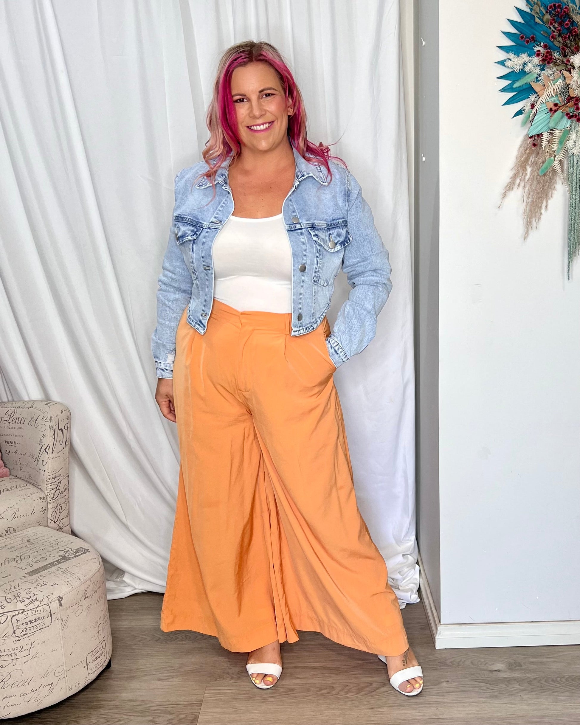 Lillian Palazzo Pants - Melon | Sass Clothing | The Lillian Palazzo Pants are a stunning shape to take you from office to after hours, year round. The pleats at the top streamline into a wide leg for the utmost in