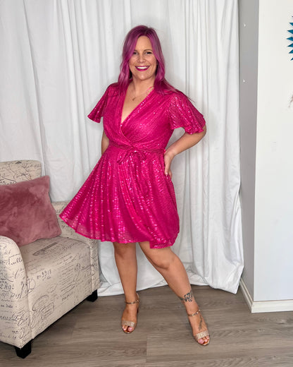 Myria Sequin Dress: Myria is here and ready to party! This sequin number is a fun and flirty mini dress, perfect for dancing the night away

Bra friendly
Pull aside breastfeeding access - Ciao Bella Dresses 