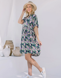 Ella Babydoll Mini Dress: Meet Ella, your new fave chuck on and go style! A babydoll design dress in a beautiful new floral print. Comfortable and flowing the dress features a V neckline, sho - Ciao Bella Dresses 