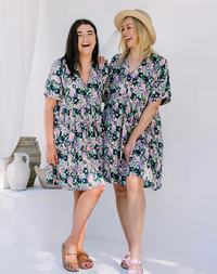 Ella Babydoll Mini Dress: Meet Ella, your new fave chuck on and go style! A babydoll design dress in a beautiful new floral print. Comfortable and flowing the dress features a V neckline, sho - Ciao Bella Dresses 