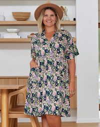 Ella Babydoll Mini Dress: Meet Ella, your new fave chuck on and go style! A babydoll design dress in a beautiful new floral print. Comfortable and flowing the dress features a V neckline, sho - Ciao Bella Dresses 