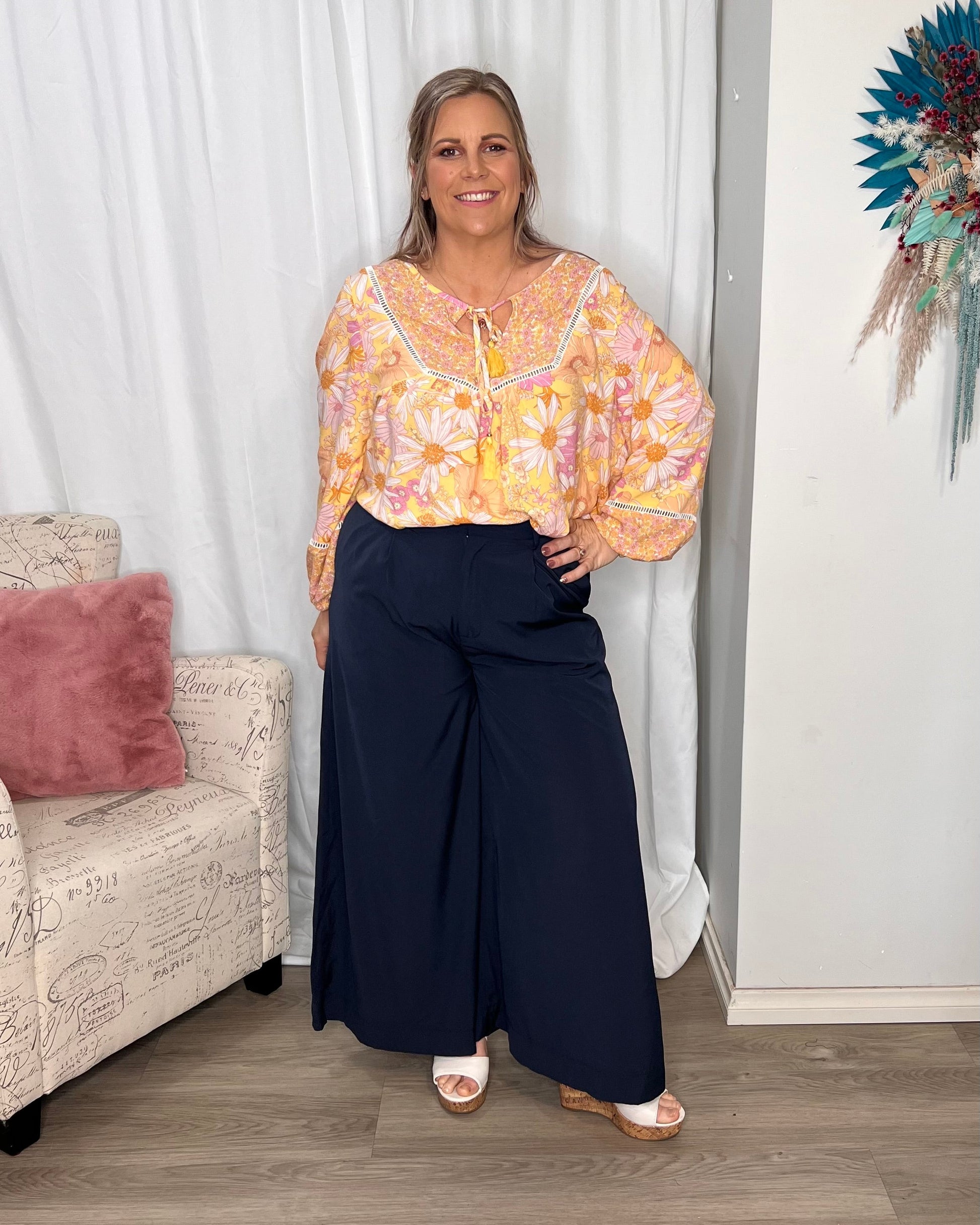 Lillian Palazzo Pants - Navy | Sass Clothing | The Lillian Palazzo Pants are a stunning shape to take you from office to after hours, year round. The pleats at the top streamline into a wide leg for the utmost in