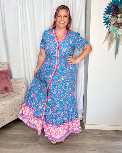 Emmy Boho Dress: The Emmy Dress features a beautiful soft songbird pattern in one of our most popular shapes. This gorgeous dress features a thick shirred waistband, functional butto - Ciao Bella Dresses 