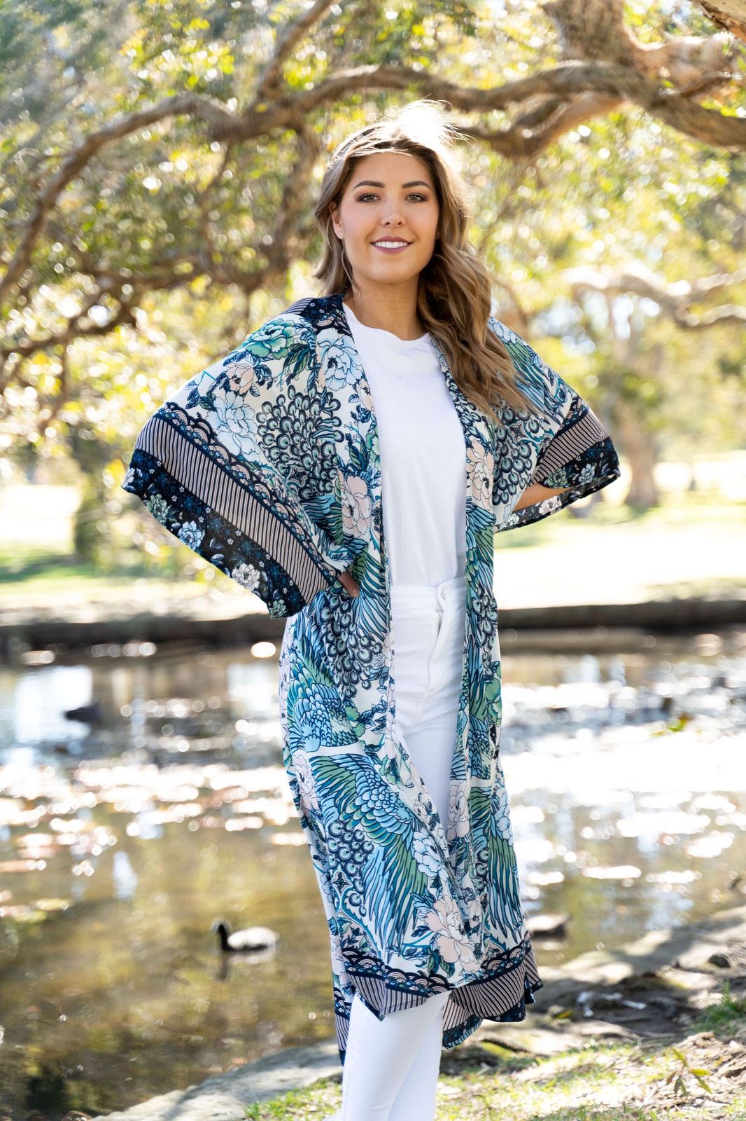 Boho Cape: A simple and easy way to brighten up the most basic of outfits - chuck on and go! These gorgeous Boho Cape's come in a range of eye-catching prints to level up your  - Ciao Bella Dresses