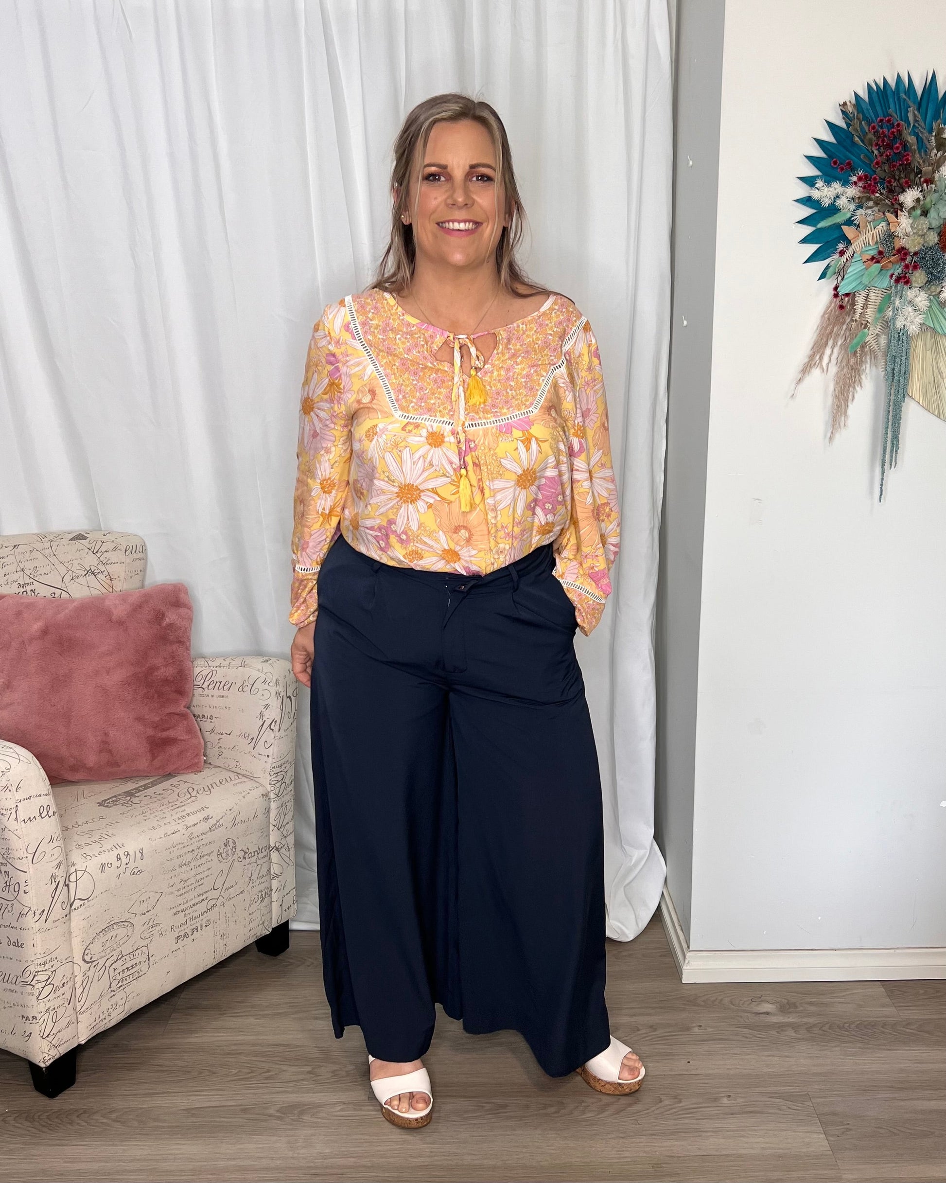 Lillian Palazzo Pants - Navy | Sass Clothing | The Lillian Palazzo Pants are a stunning shape to take you from office to after hours, year round. The pleats at the top streamline into a wide leg for the utmost in