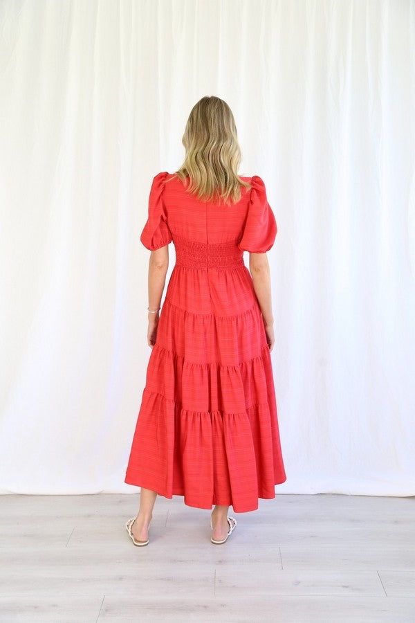 Natalia Crossover Dress | Roseason | The Natalia Dress is ready for your next cocktail event. It is a long midi dress with a full tiered skirt with plenty of swish. The bodice is a low V cut, with a hoo