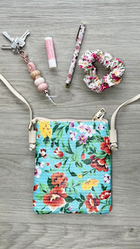 Crossbody Pouch Bag | IVYS | The perfect style upgrade can be found with the Crosshatch Tassel Crossbody Bag. Choose your ideal shade from our range and don't be afraid to flaunt it. This purse 