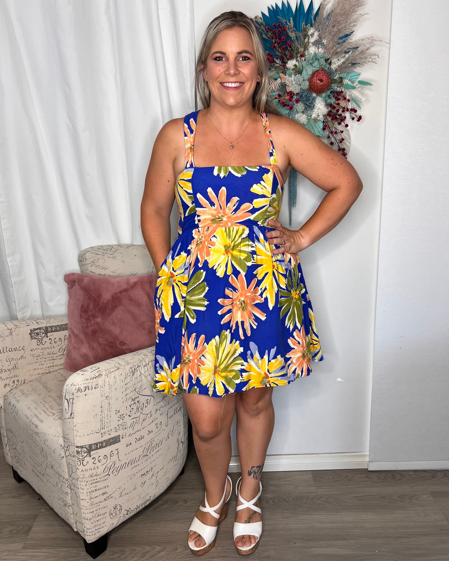 Mae Dress: This sweet little summer dress will brighten the day of everyone around you
Features:

Shirred panels at side for adjustable bust
Convertible back - wear it in a mul - Ciao Bella Dresses - Iris Maxi